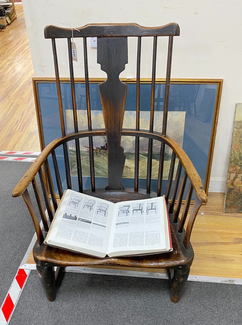 A mid 18th century West Country ash and elm Windsor armchair, (cut down), width 61cm, depth 41cm, height 99cm. (See figure SW31 page 271 Bernard Cotton The English Regional Chair).